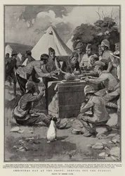 Día de Navidad en el frente, sirviendo el pudín